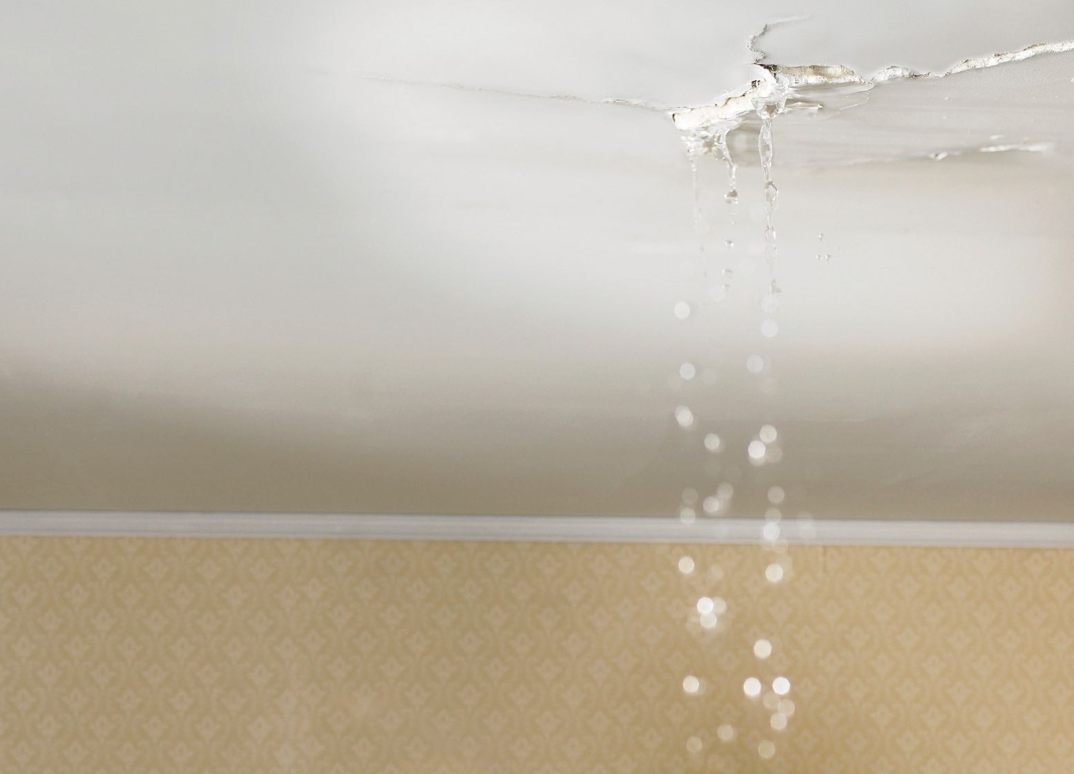 Water leaking through a ceiling