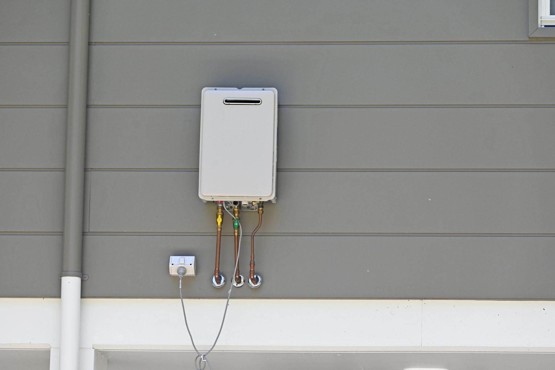 Wall-mounted tankless water heater