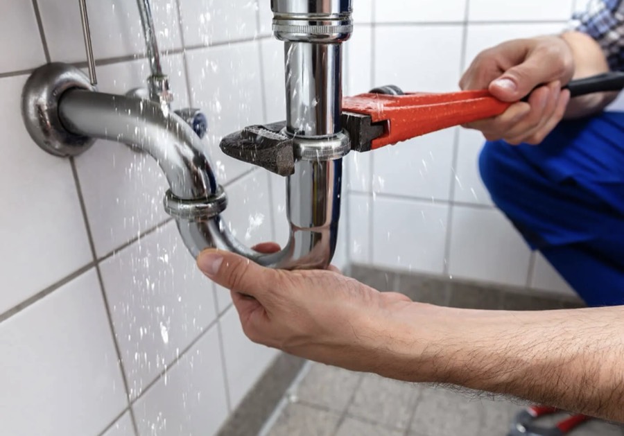 Vaquero Plumbing technician repairing a pipe
